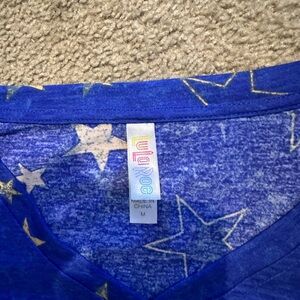 LulaRoe star shirt. Size Medium.  Great condition.